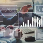 Big data analytics, financial charts, business team working on computer.