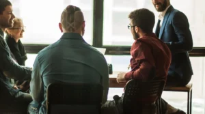 multinational business team brainstorms in the workplace in a mo