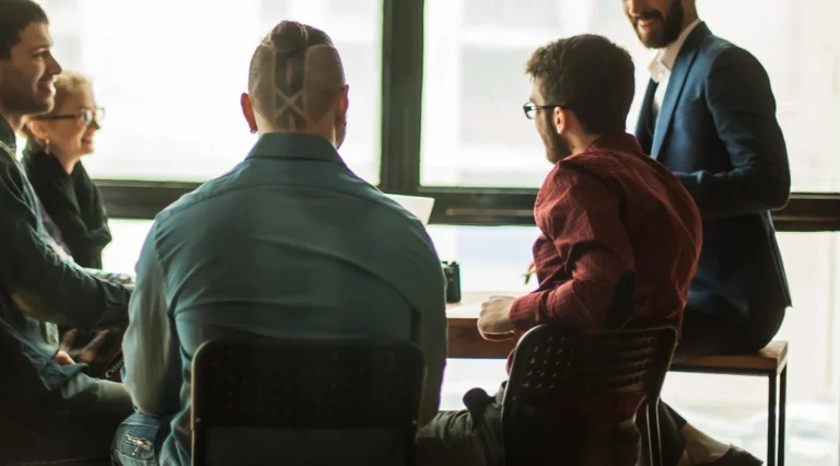 multinational business team brainstorms in the workplace in a mo