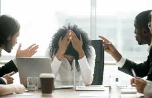 Depressed black woman leader suffering from gender discrimination at work
