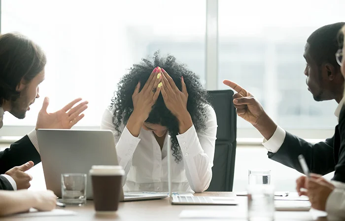 Depressed black woman leader suffering from gender discrimination at work