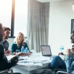 Business people having casual discussion during meeting