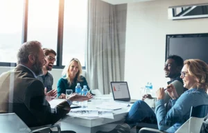 Business people having casual discussion during meeting