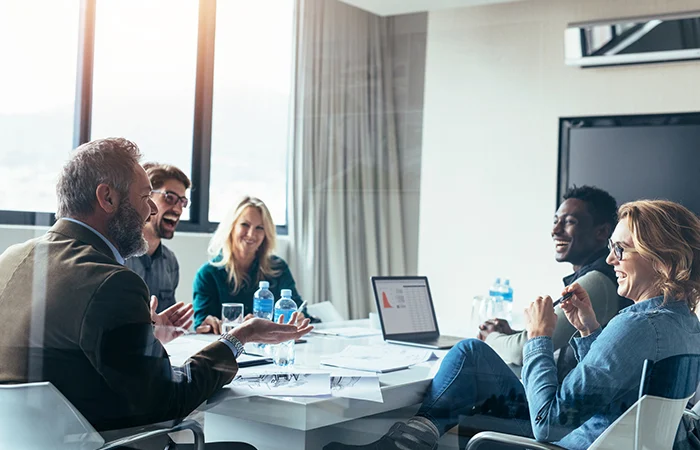 Business people having casual discussion during meeting