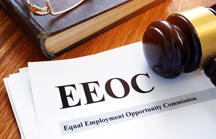 EEOC equal employment opportunity commission report and gavel.
