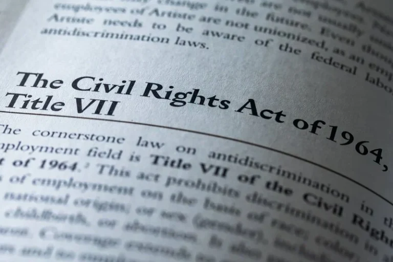 Civil Rights Act of 1964 Title VII written in business textbook