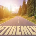 Retirement word written on road in the mountains