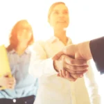 Business people shaking hands