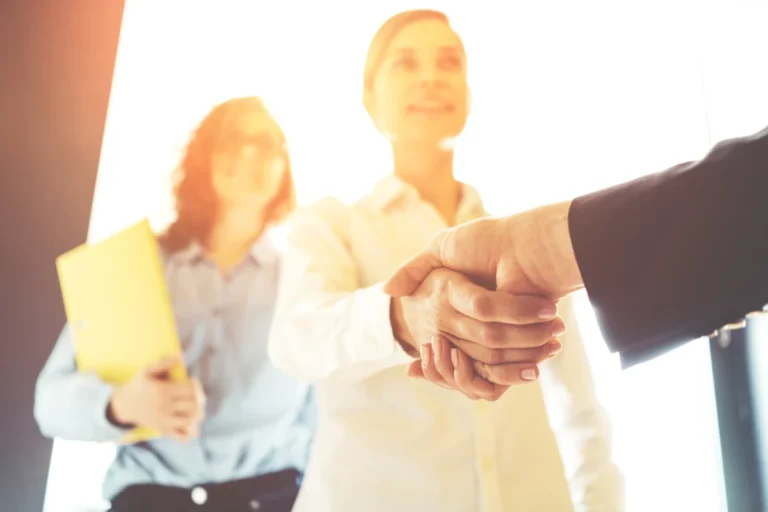 Business people shaking hands