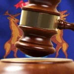 Wood Gavel Standing Front Of the Michigan Flag Closeup 3d Render